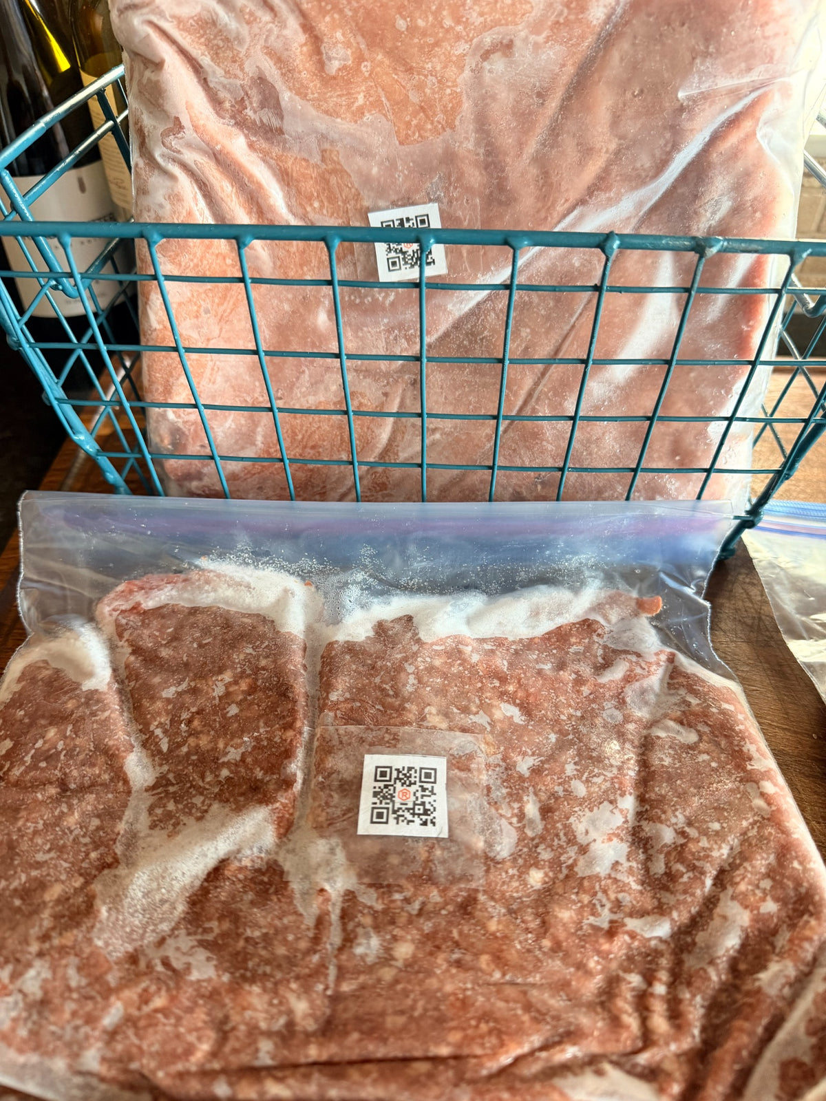 RIVET compact QR label on freezer meat in a wire basket