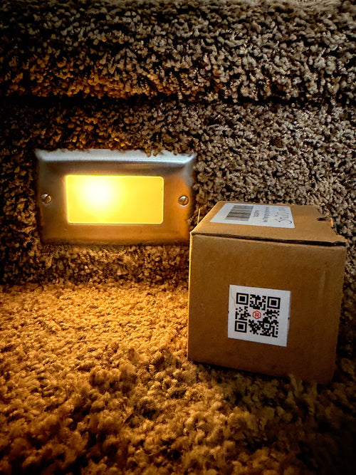 RIVET compact QR label on a box of spare outdoor lights